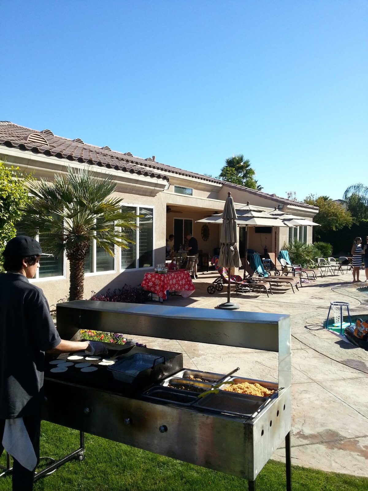 Busy taco catering cart working a real event