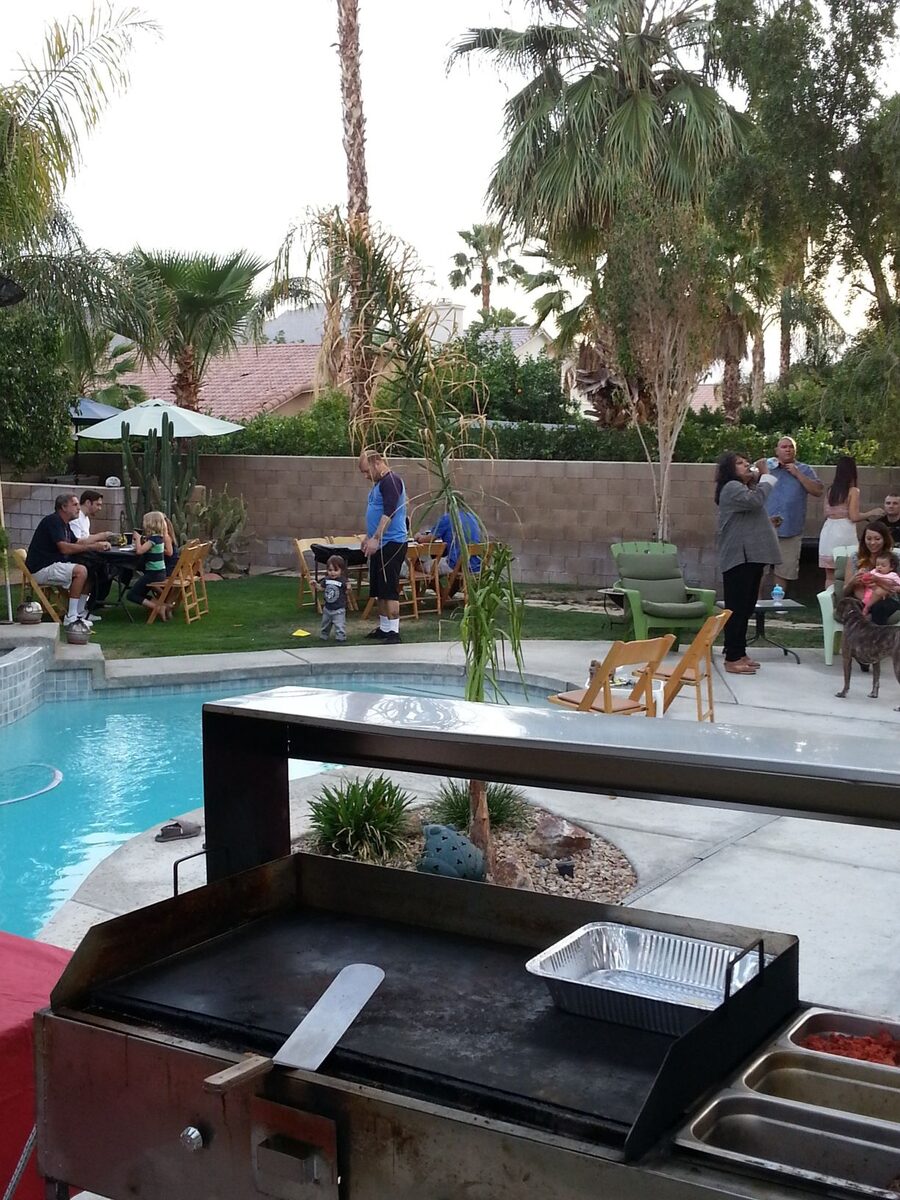 Taco catering set up at a poolside venue event