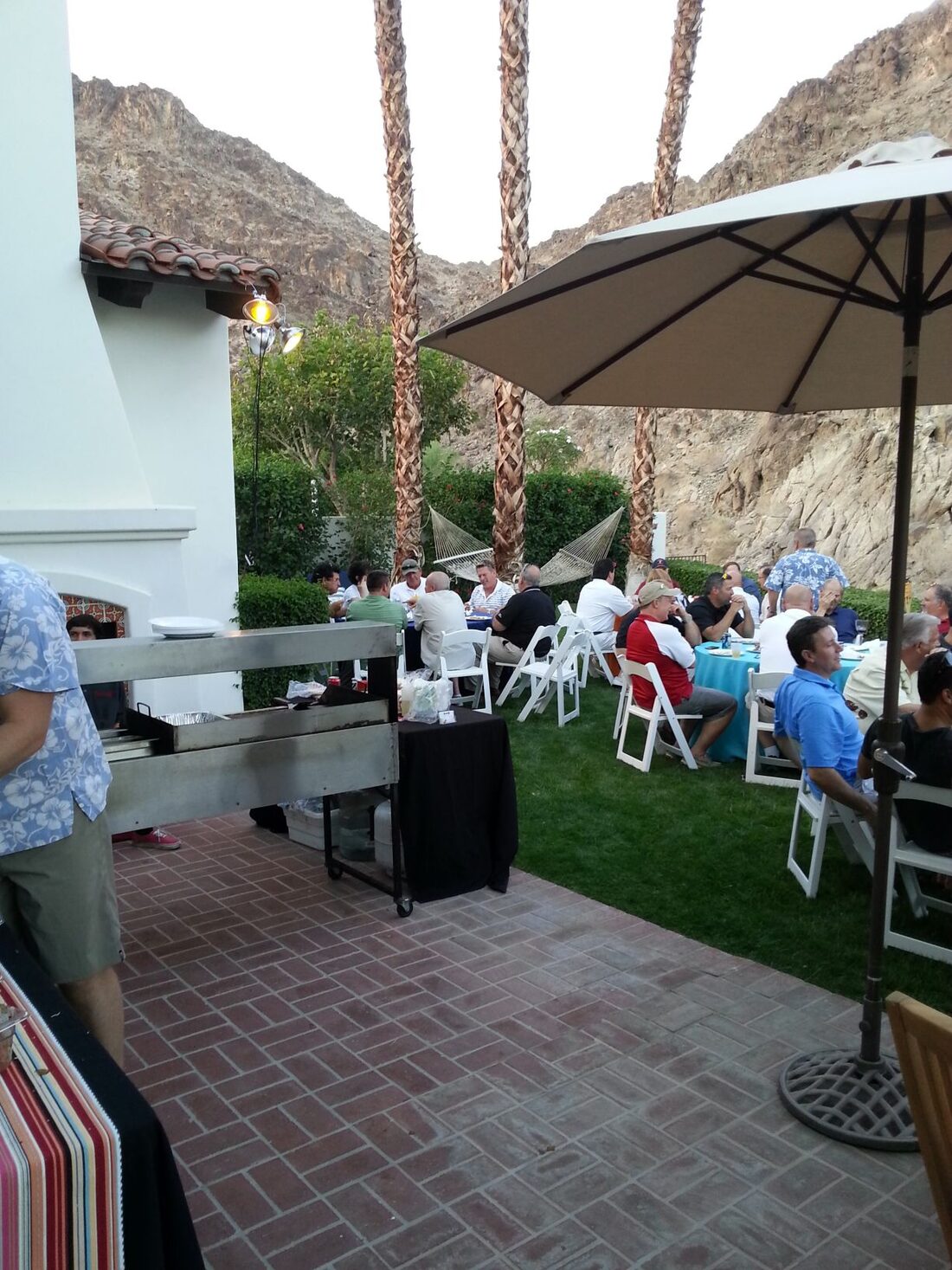 Taco cart serving a crowd of guests at an event