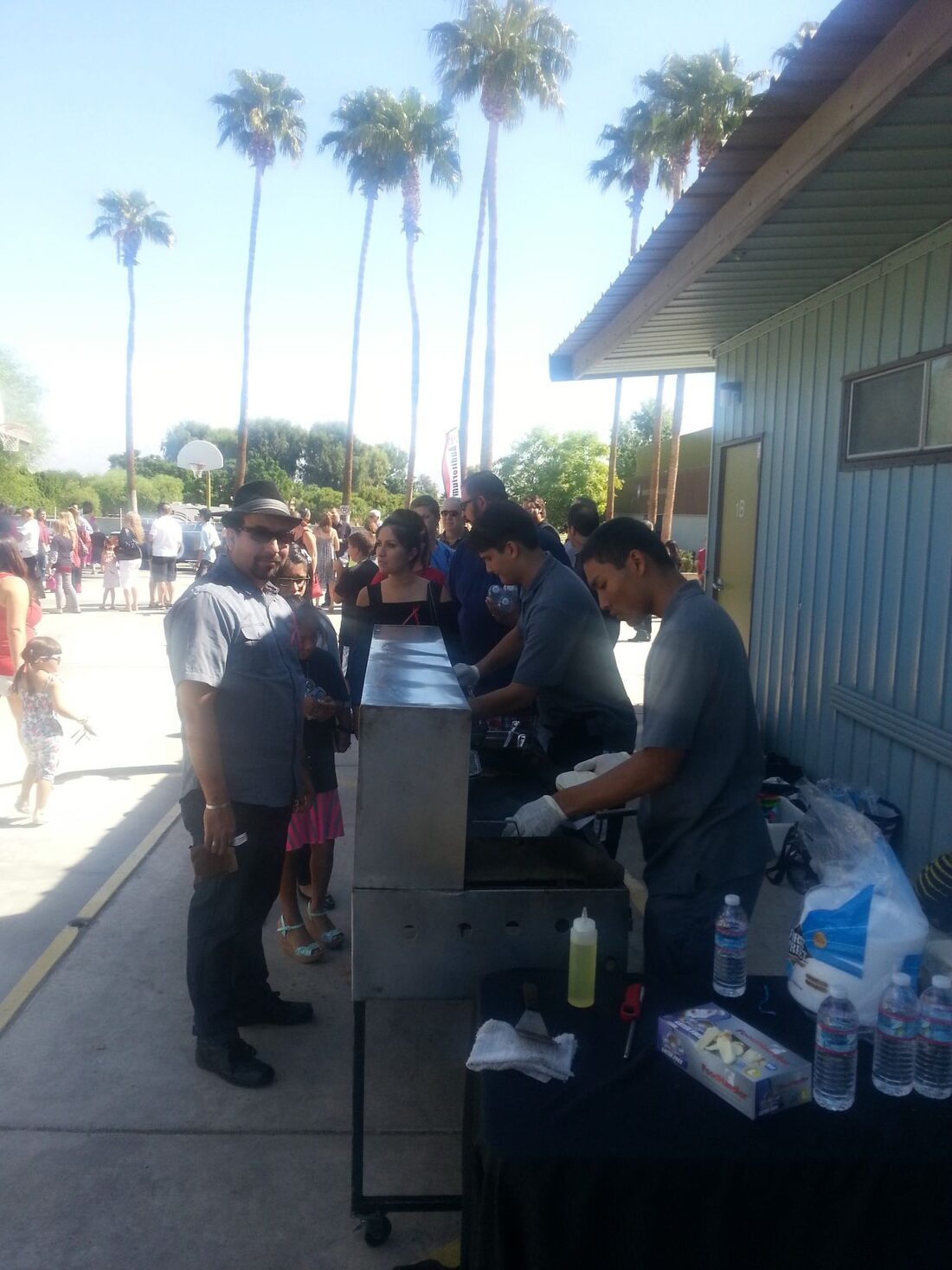 Taco caterer cooking at an evening event