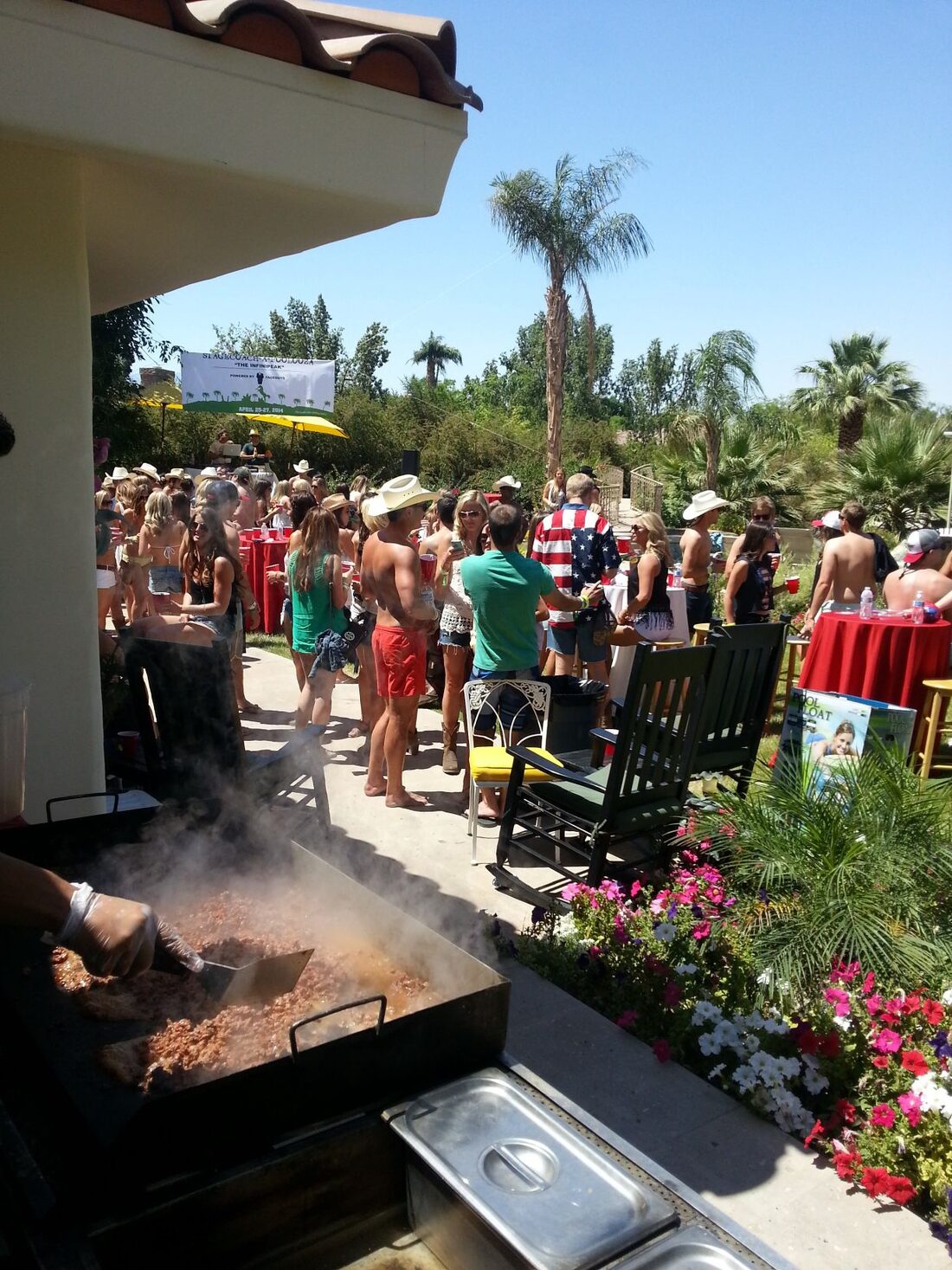 Taco caterer cooking on the grill for a crowd