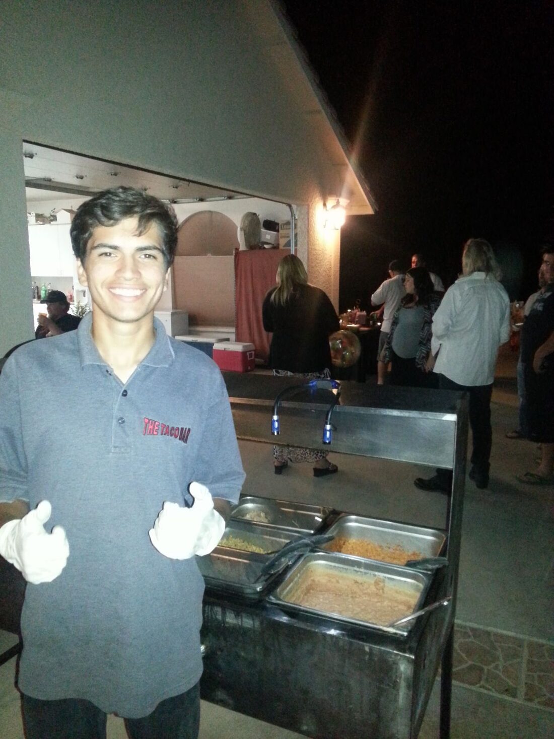 Taco catering cart set up for an evening event