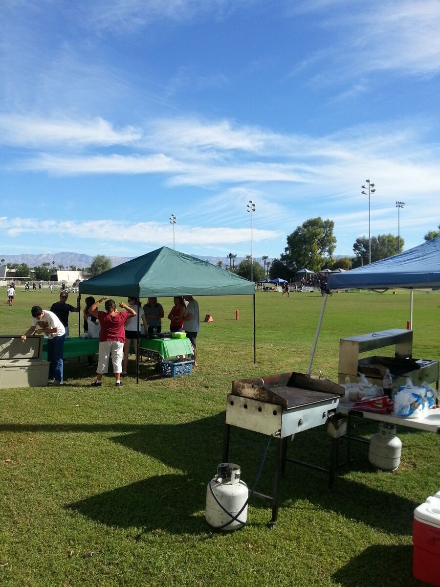 Local taco catering event set up on a lawn